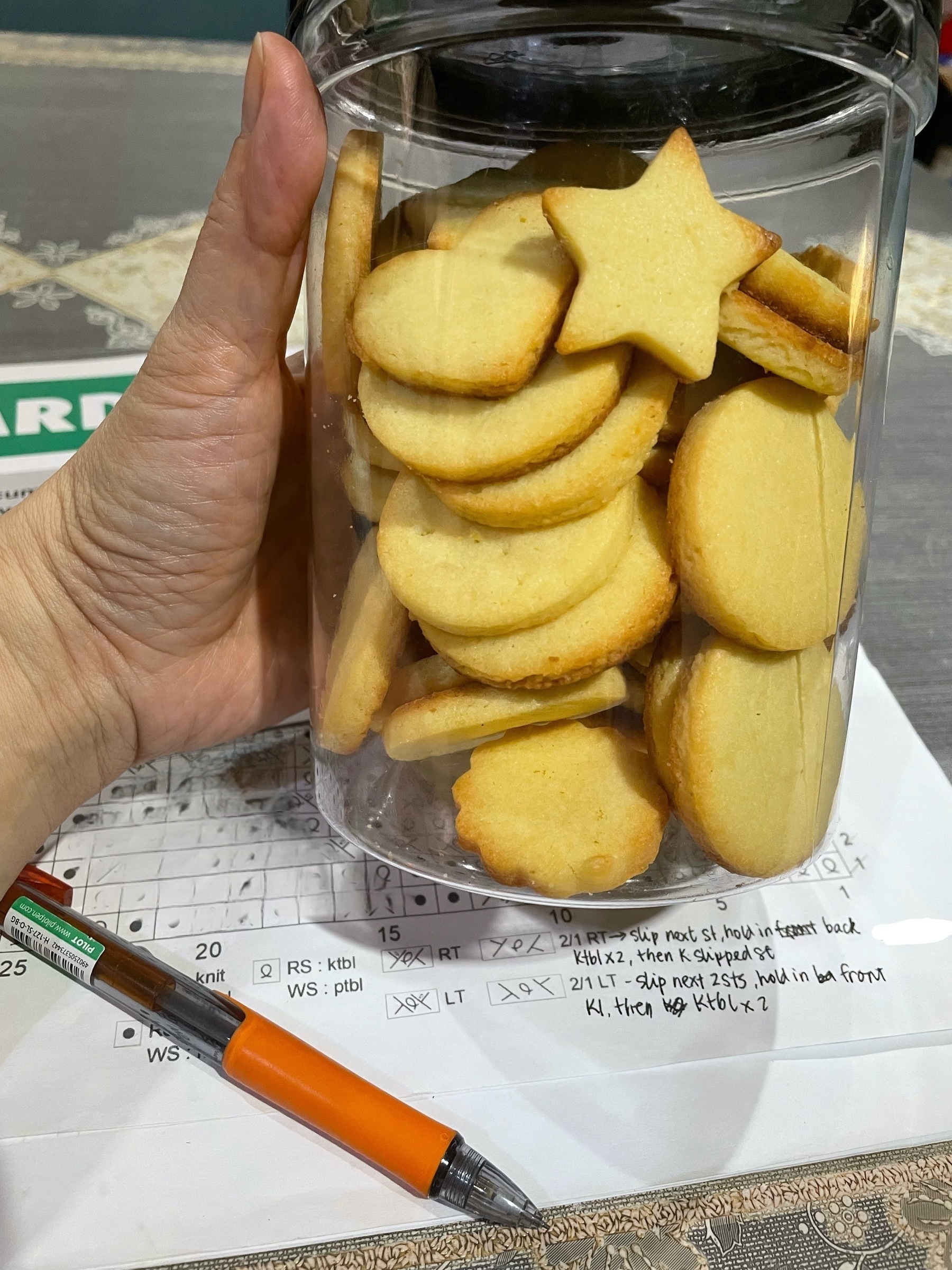 Freshly made, home baked butter cookies in a plastic jar