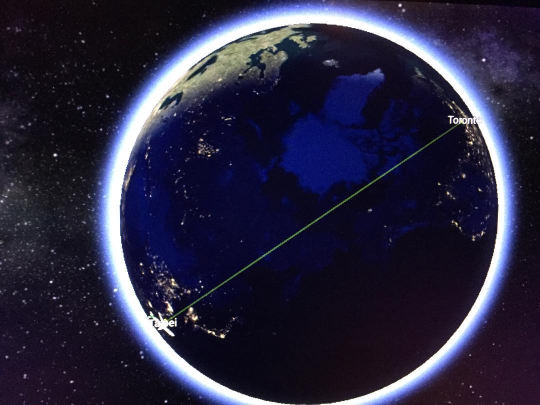 flight path from Taipei to Toronto appears to slice the planet in half