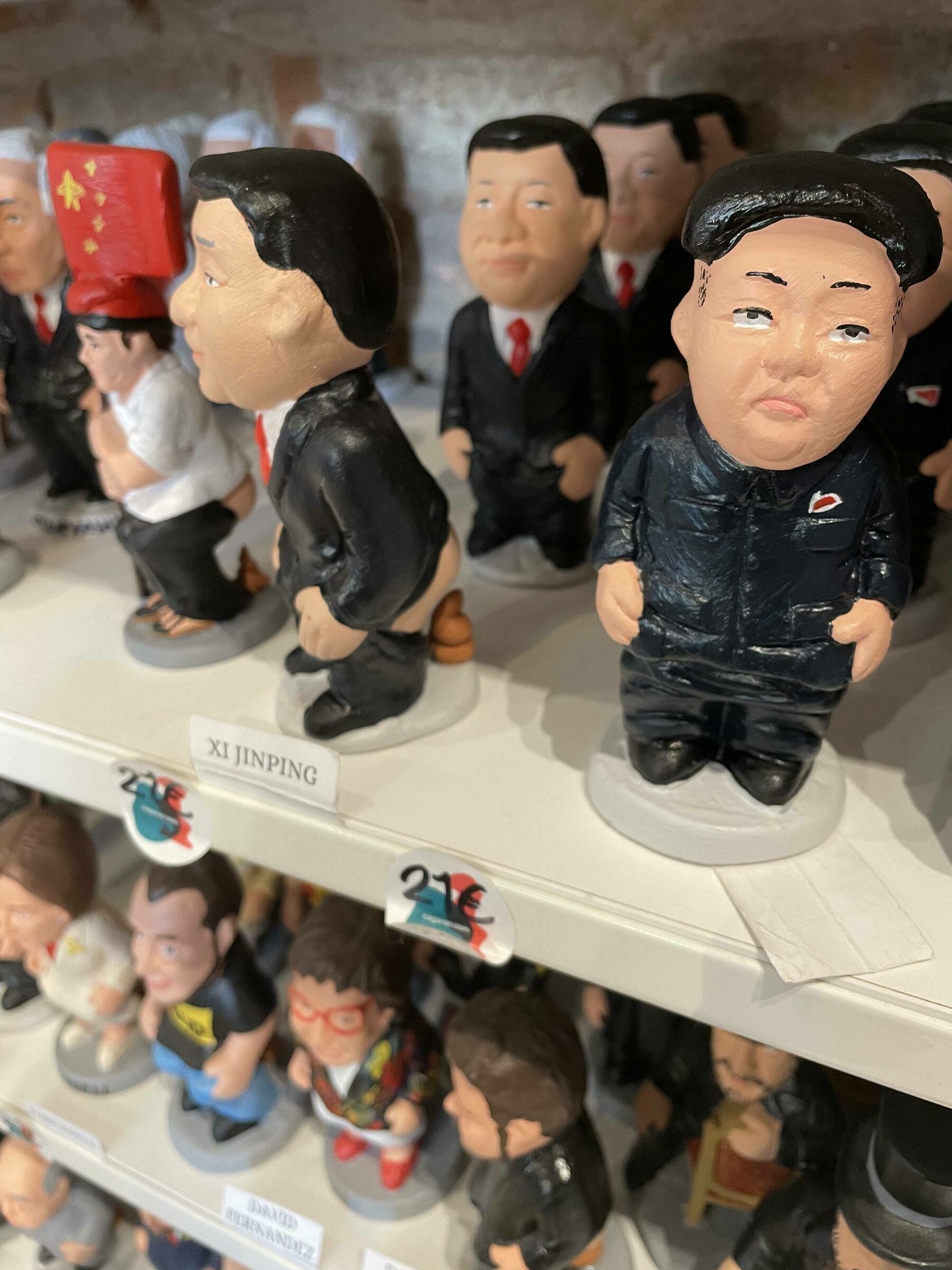 Wacky figurines of famous people with their pants down, poop under their exposed bottoms. These are sold in a shop in Barcelona for €21