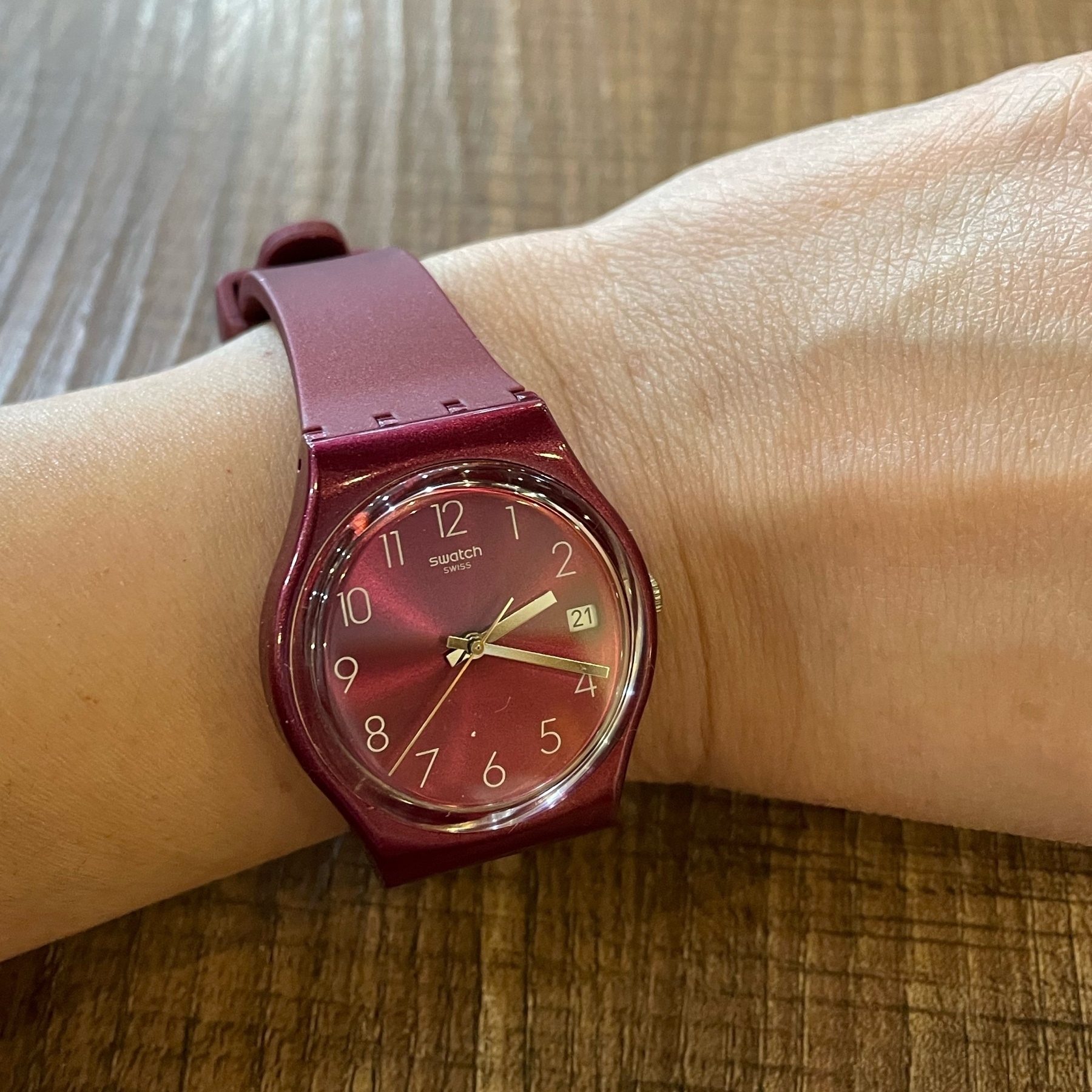 Swatch watch in mauve color